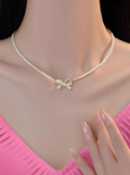 PQT-992 - Bow Shape Pearl Pendant Necklace for Women – Dainty Jewelry with Sparkling Bow Design | Available in Silver &amp; Golden Finish | Perfect Gift for Weddings, Parties &amp; Everyday Glamour - Golden