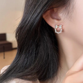 Pearl Bow Korean Zircon Earrings for Women – Elegant Bowknot Design with Sparkling Zircon and Pearl Accents | Premium Golden and Silver Fashion Jewelry for Weddings, Parties, and Everyday Wear | AXT-100 - Golden